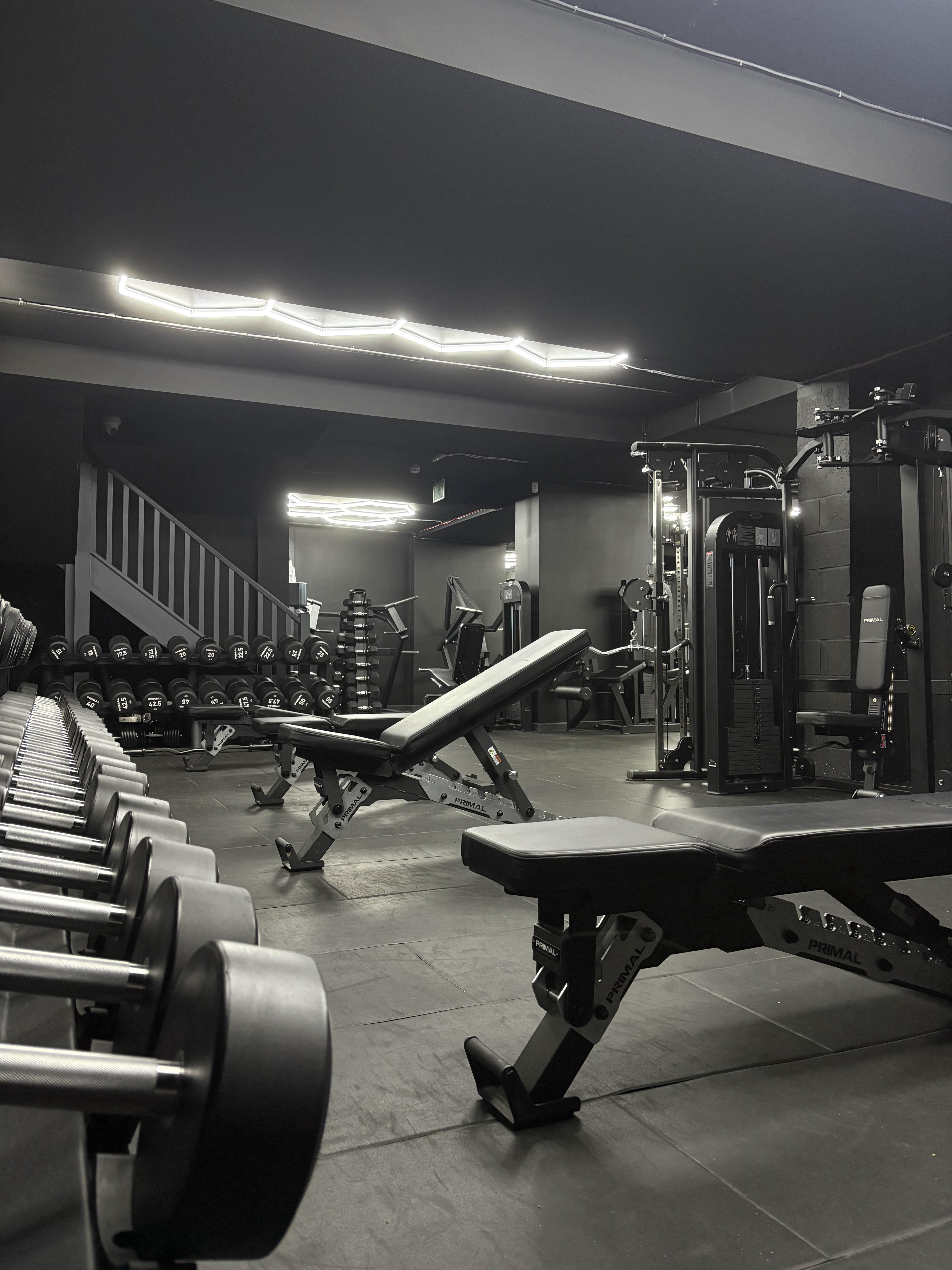 Machine and bench area on the gym floor