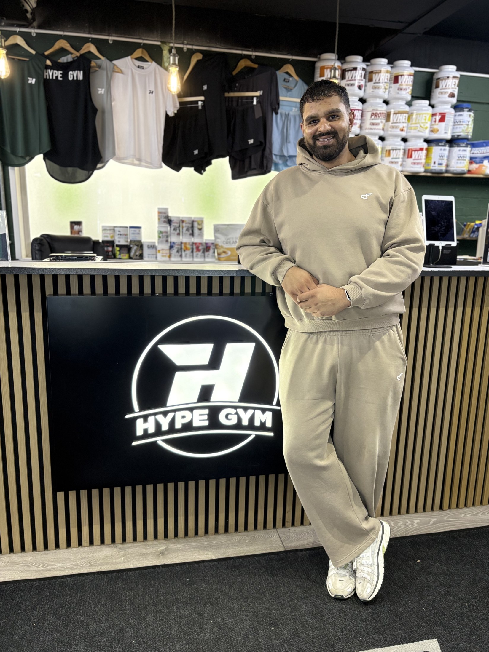 Co-owner Pardeep at the Hype Gym reception desk and supplement bar